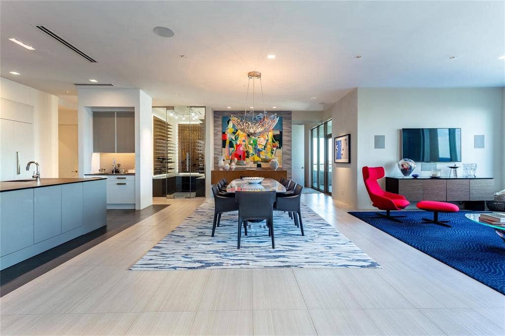 A 10-person dining area flanked by the Kitchen and the Media area