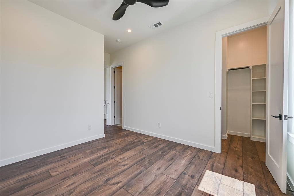 2247 Mail Avenue, #103, Dallas, TX 75235 Wood-finish flooring, recessed lighting, and a ceiling fan