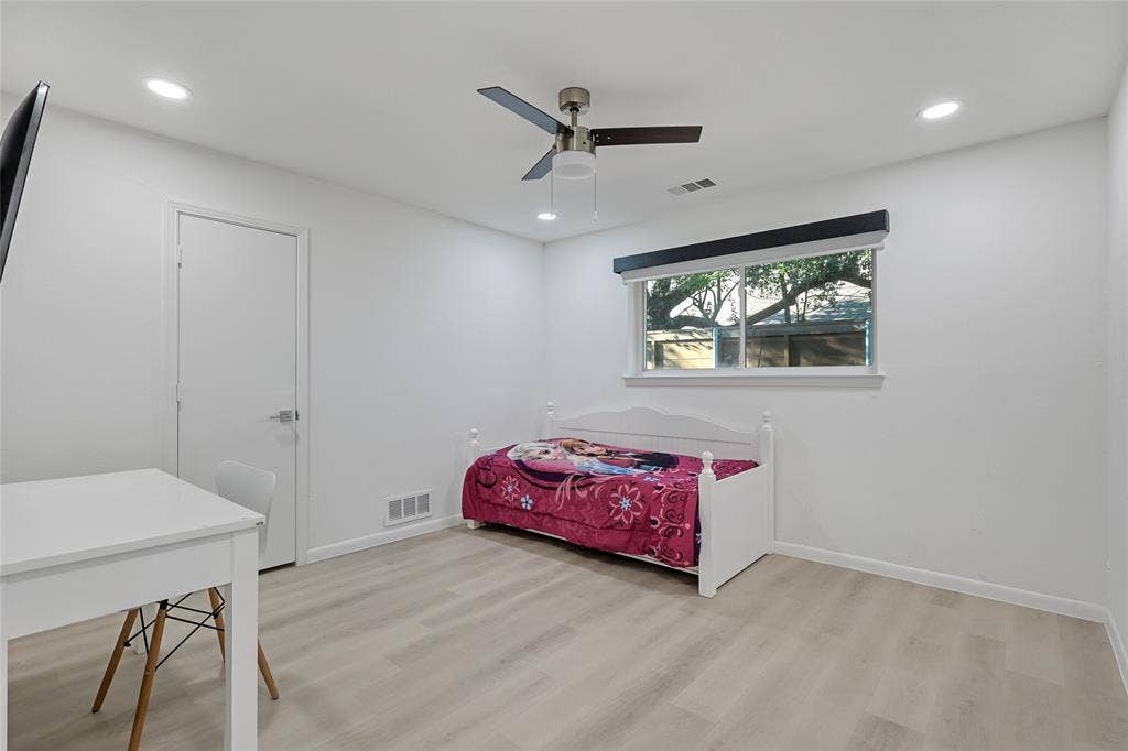 6802 Duffield Drive, Dallas, TX 75248 Recessed lighting, ceiling fan, and light wood-finish flooring