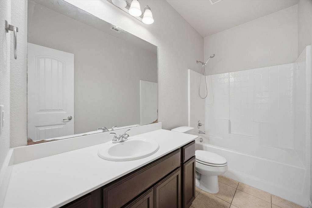 408 Northgate Drive, Terrell, TX 75160 Vanity with white countertop, chrome faucet, and integrated sink