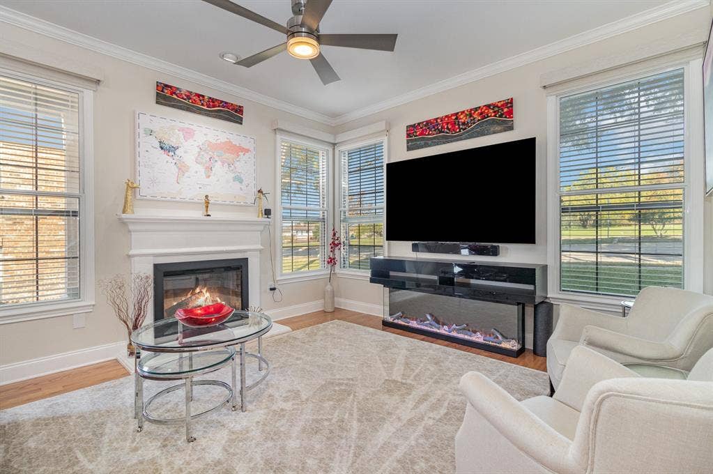 2800 Keller Springs Road, #8C, Carrollton, TX 75006 Remodeled first floor now offers an open floor plan with new wood flooring, multiple windows with electronic shades.