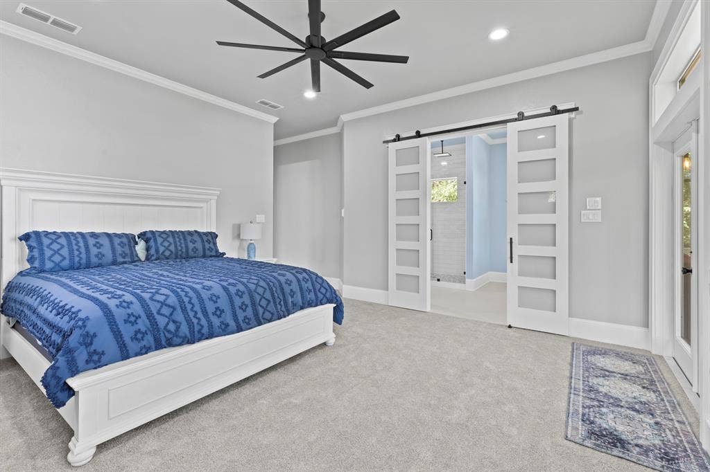 18630 Eastside Road, Troup, TX 75789 Light gray carpeting with crown molding and recessed lighting