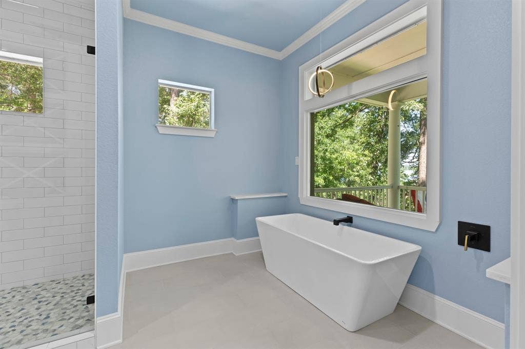 18630 Eastside Road, Troup, TX 75789 Freestanding soaking tub with wall-mounted matte black faucet
