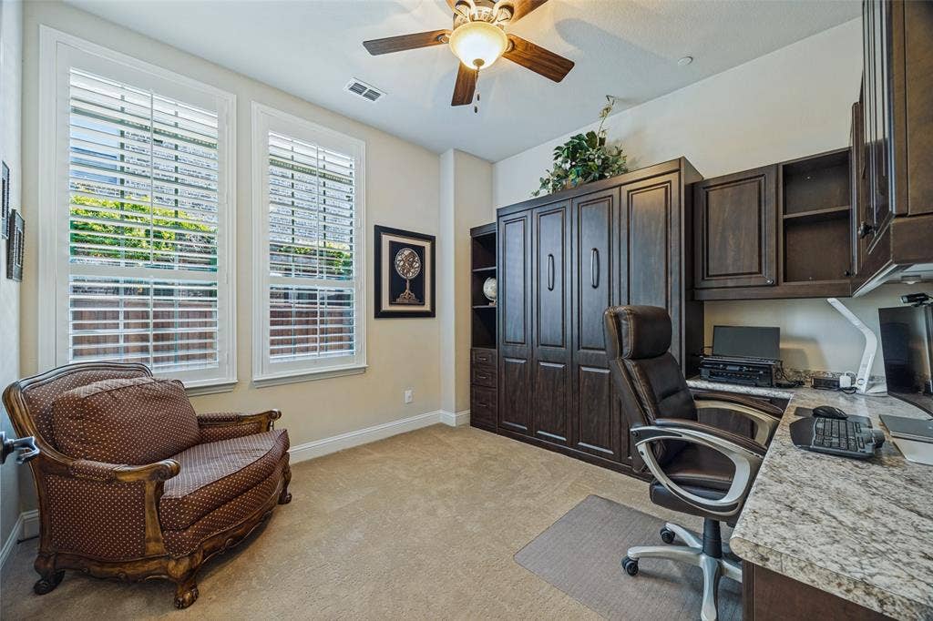 2516 Bill Moses Parkway, Farmers Branch, TX 75234 The downstairs bedroom is currently configured as a home office but the Murphy Bed turns it into a guest bedroom!