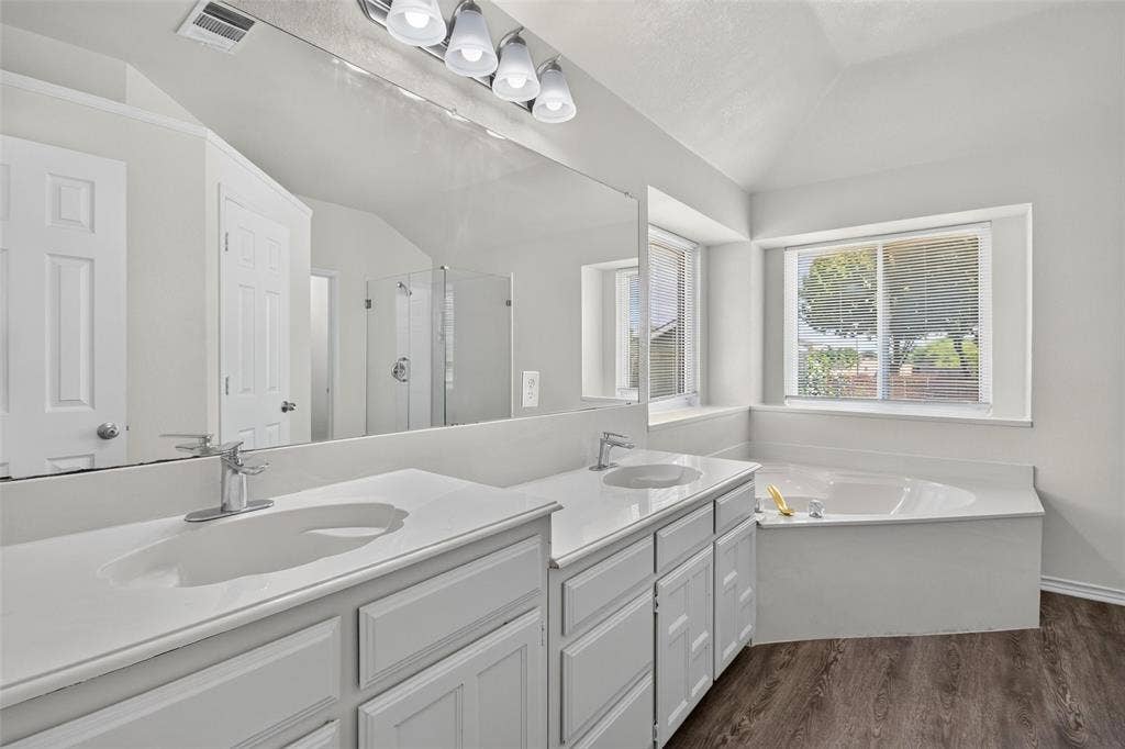 1101 Boyd Drive, Wylie, TX 75098 Dual vanity with white cabinetry, white countertops, and integrated sinks