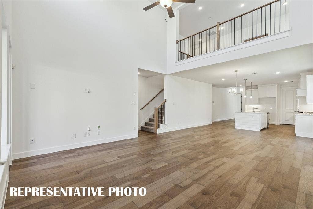 5401 Roselyn Way, McKinney, TX 75070 The game room features open railing overlooking the family room creating a multi-level entertaining space! REPRESENTATIVE PHOTO