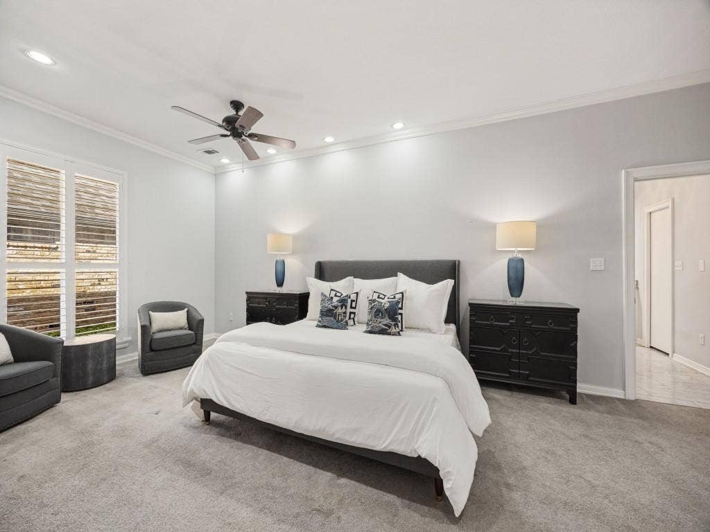 5718 Trail Meadow Drive, Dallas, TX 75230 Primary bedroom with a sitting area by the window
