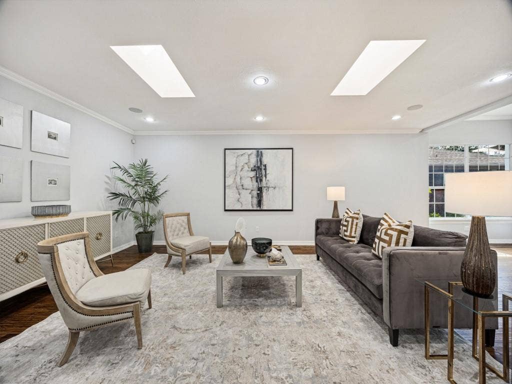 5718 Trail Meadow Drive, Dallas, TX 75230 Skylit great room flows to the dining area, kitchen and den