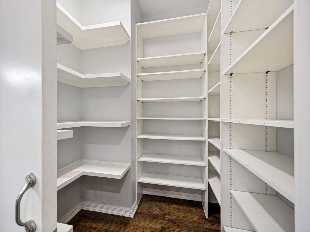 5718 Trail Meadow Drive, Dallas, TX 75230 Walk-in pantry with floor-to-ceiling shelving