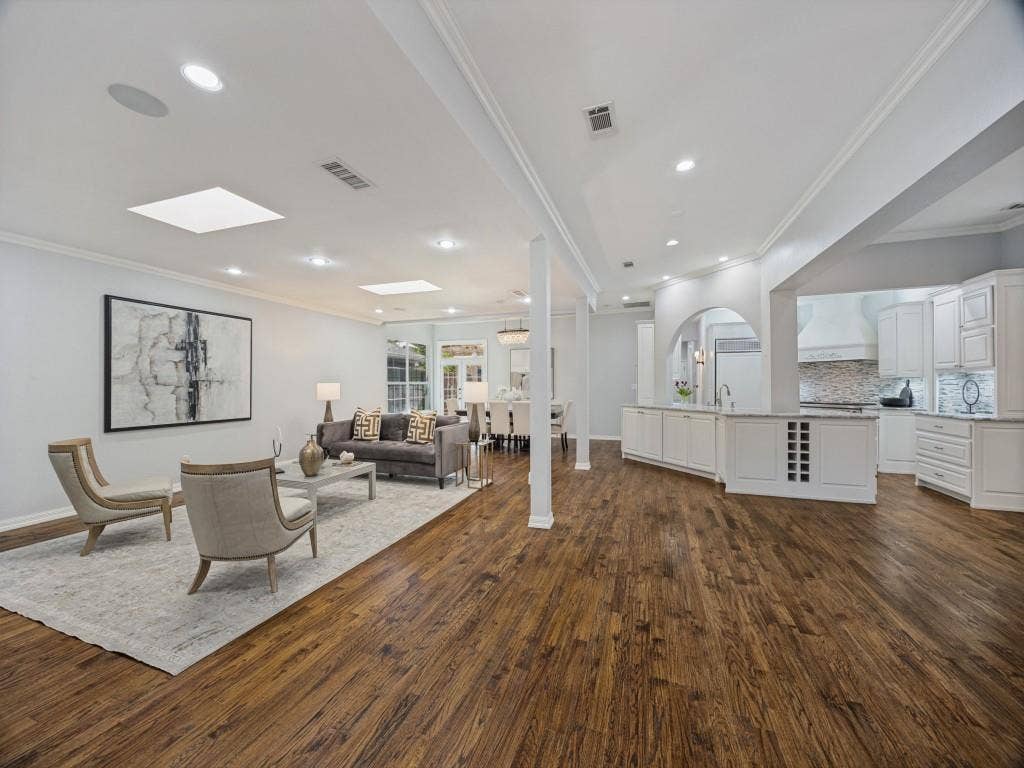 5718 Trail Meadow Drive, Dallas, TX 75230 Open-concept living, dining and kitchen with skylights and hardwoods throughout
