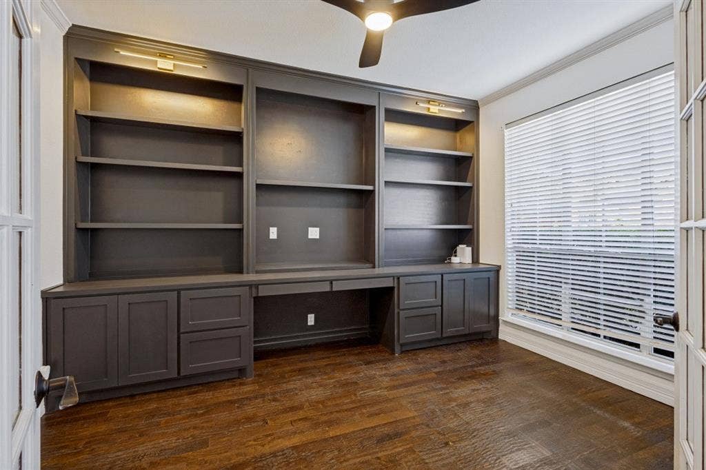 STUNNING OFFICE SITS ON THE FRONT OF THE HOME WITH FRENCH DOORS