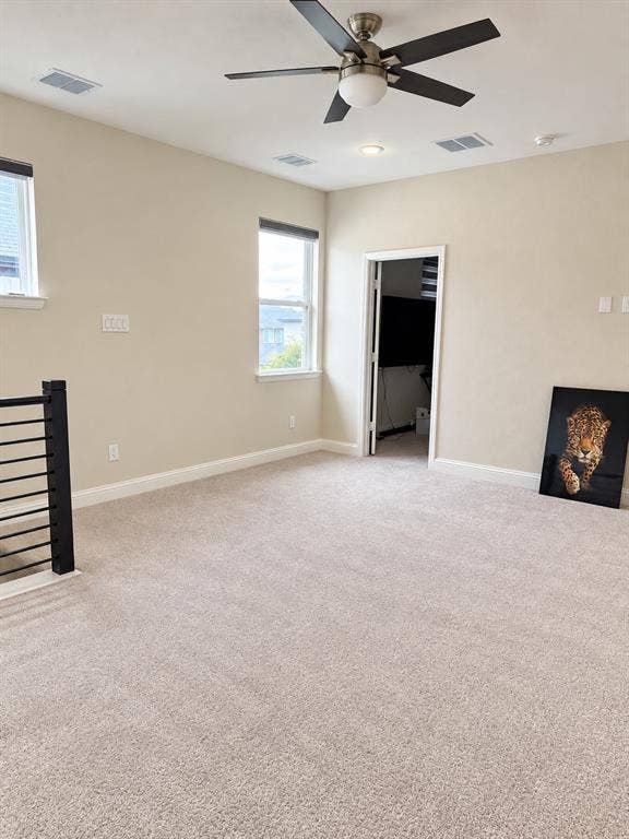 10755 Wells Branch Road, Frisco, TX 75035 Plush carpeting, contemporary ceiling fan, recessed lighting, and modern window blinds