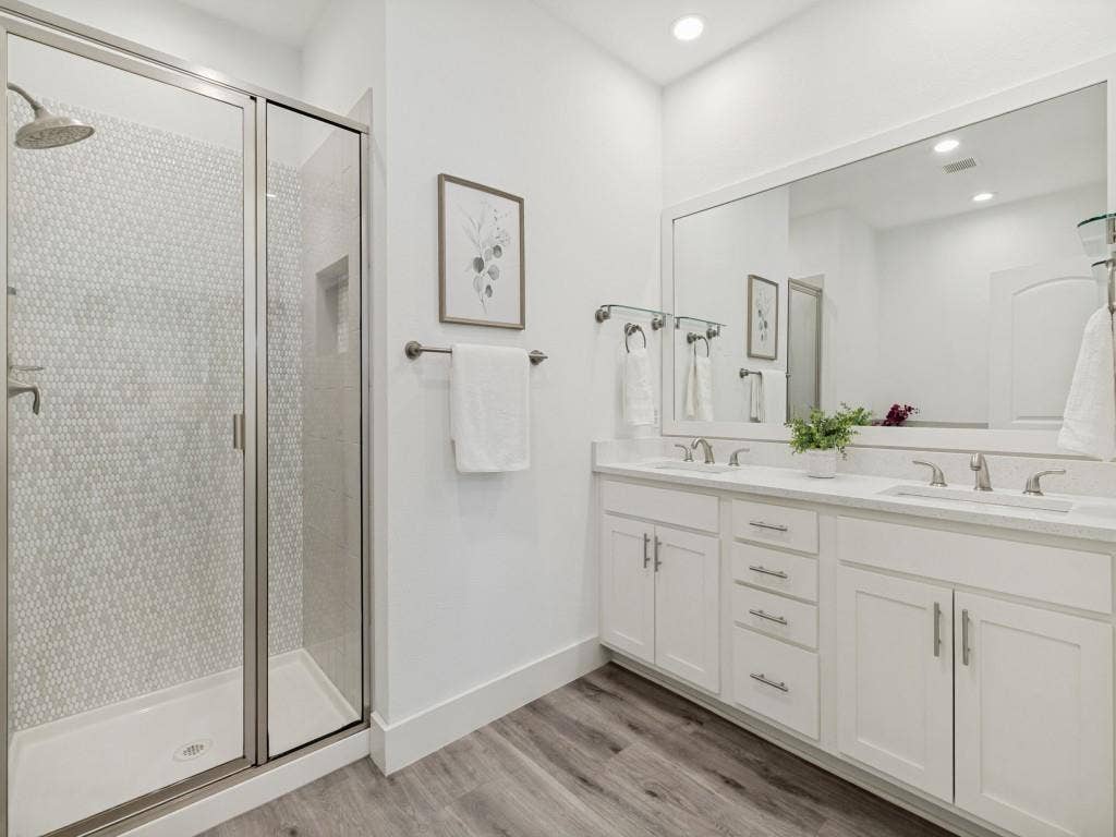 Updated Primary bath with dual sink, separate shower and tub