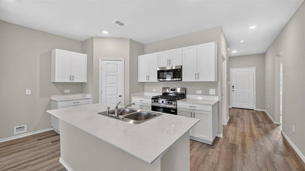 Kitchen - All Home and community information, including pricing, included features, terms, availability and amenities, are subject to change at any time without notice or obligation. All Drawings, pictures, photographs, video, square footages, floor plans, elevations, features, colors and sizes are approximate for illustration purposes only and will vary from the homes as built.