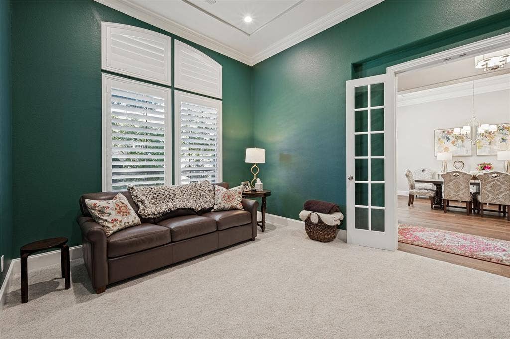 6168 Sweeney Trail, Frisco, TX 75034 Arch-top window with plantation shutters, crown molding, recessed lighting, and French doors
