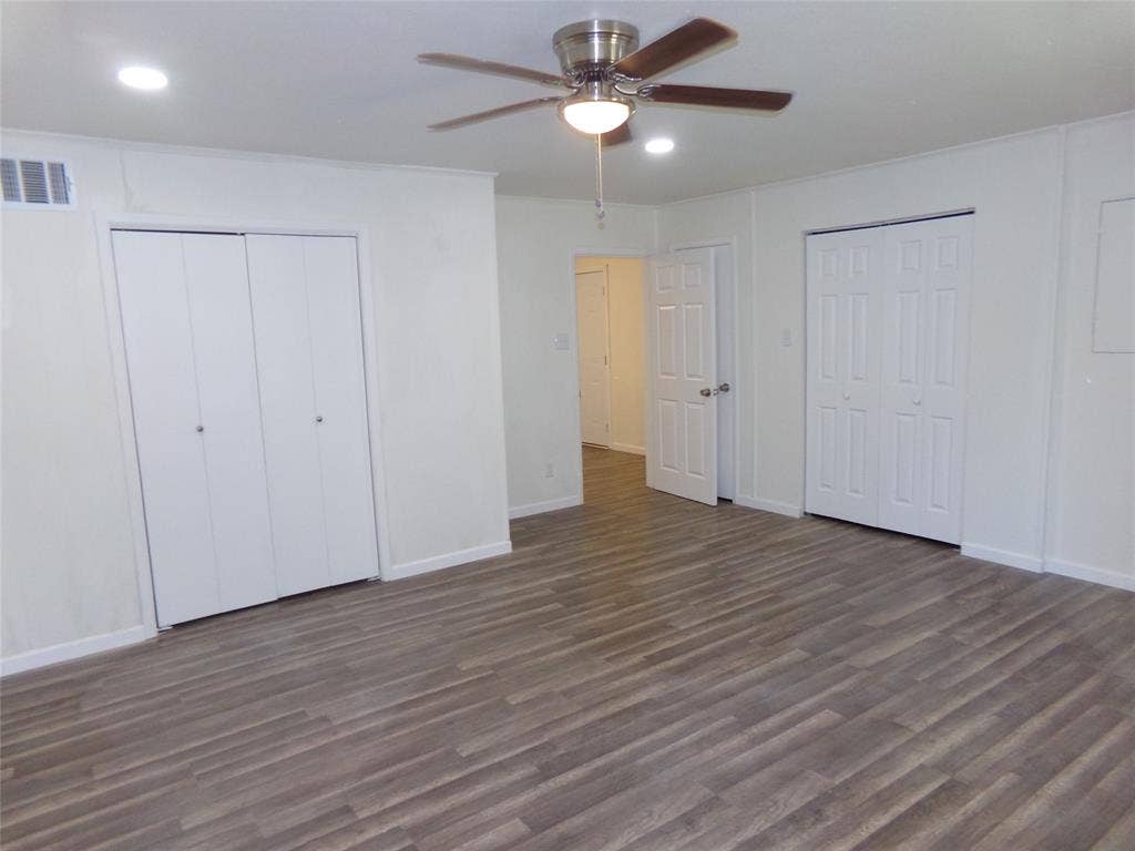 3423 Texas Drive, Dallas, TX 75211 Wood-finish flooring, recessed lighting, and a ceiling fan with light fixture