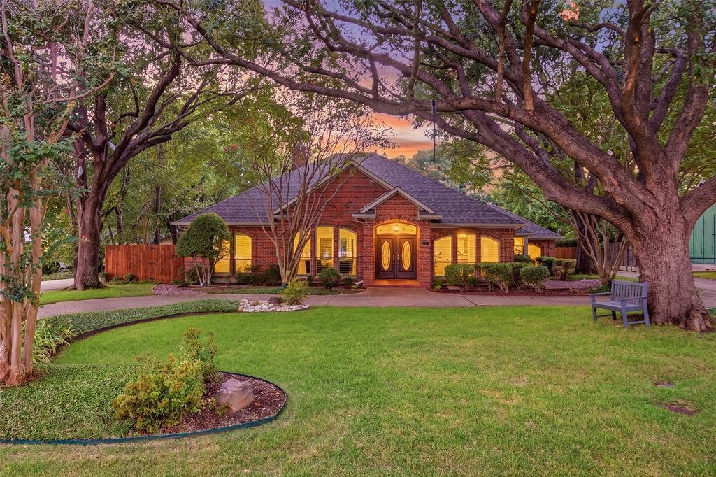 Welcome home to 17415 Marianne Cir! Mature oaks, a circular drive and classic brick curb appeal.