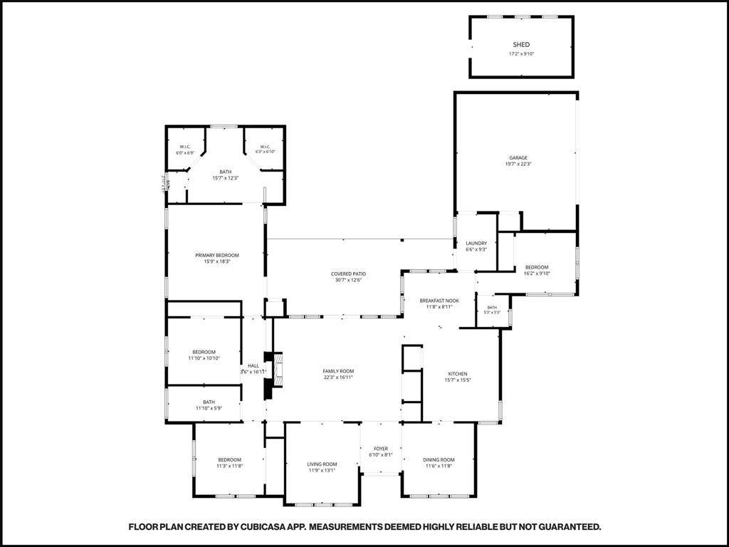 Floor plan: single-story layout with four bedrooms, living, dining and family rooms, attached garage and detached studio.