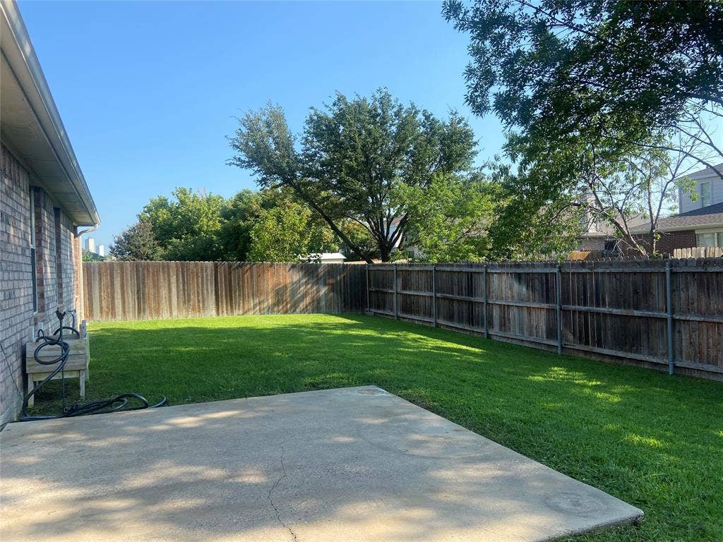 Beautiful backyard with sprinkler system