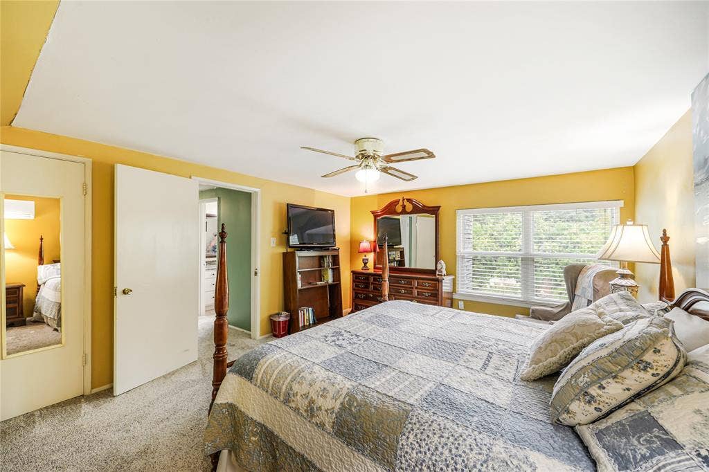 Primary bedroom with easy access to bathroom and three walk-in closets!