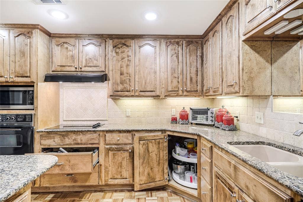 Other views of the custom cabinets for storage!