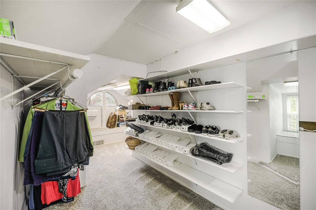 Primary bedroom upstairs has three walk-in closets!