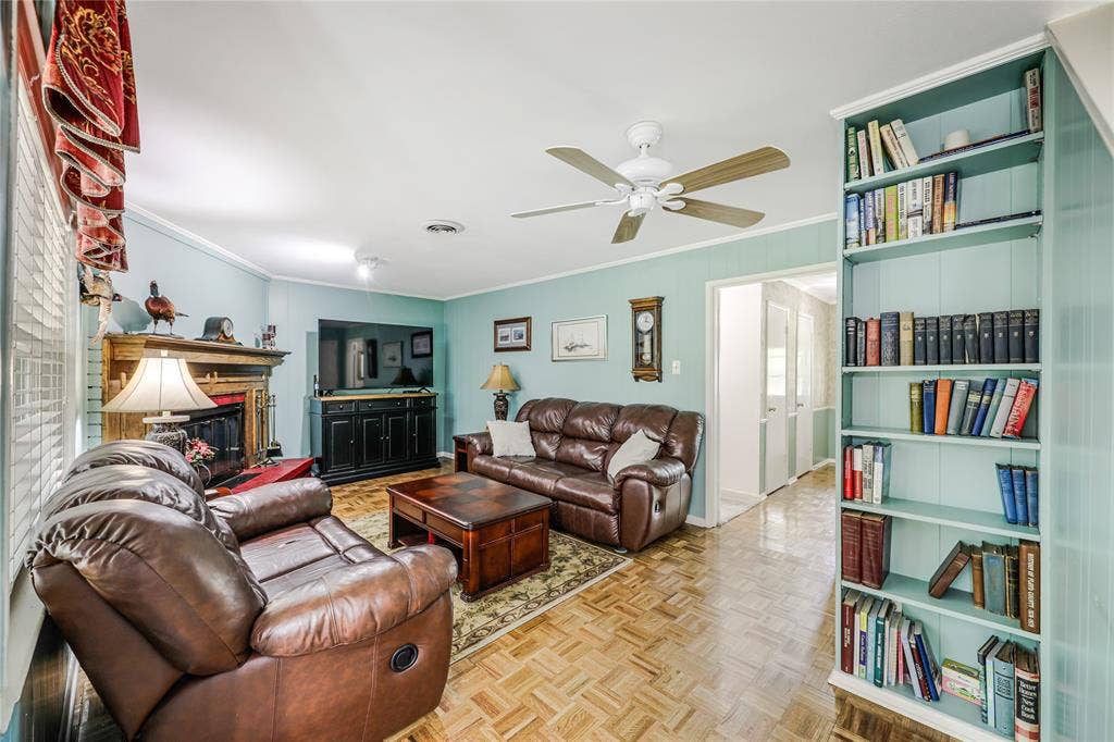 Built-in bookshelves with another nice sized understairs storage closet !