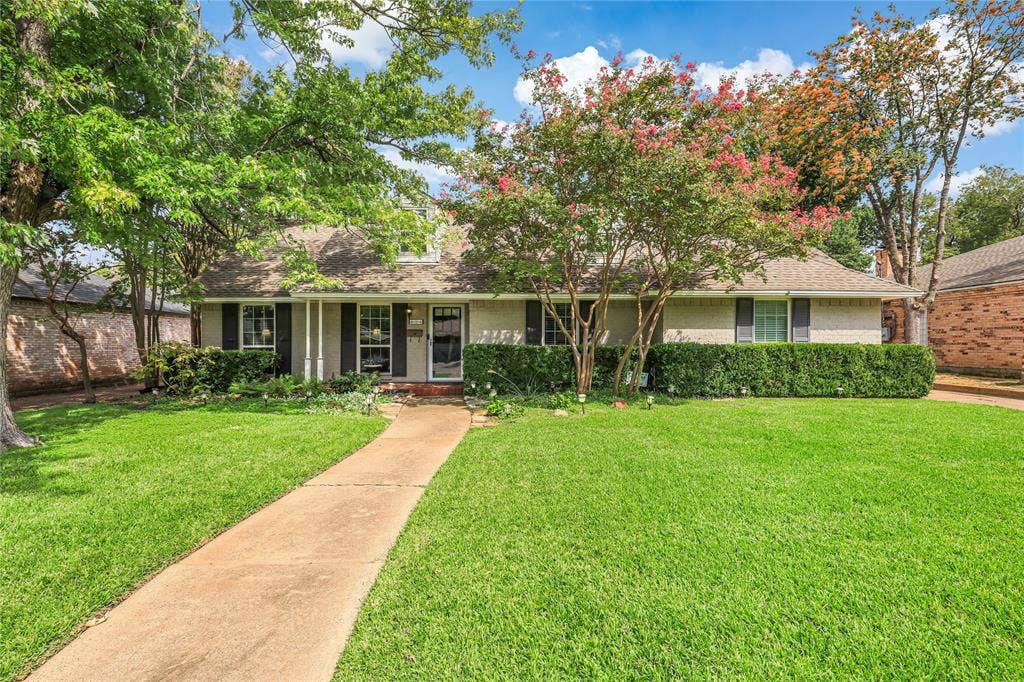 Four bedooms with two living areas and renovated kitchen opens to dining and breakfst area with easy access through french doors to outdoor patio area! Ideal for entertaining!