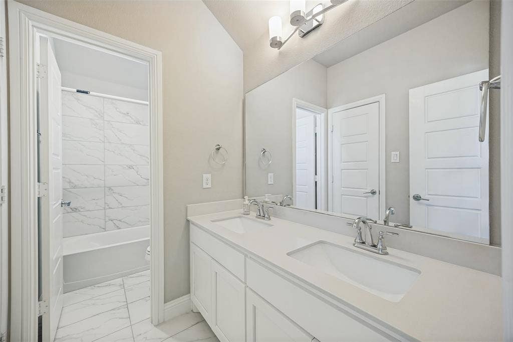 Dual vanity with undermount sinks and chrome fixtures