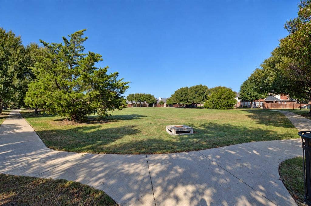 Green belt and walking trail directly accessible from backyard gate