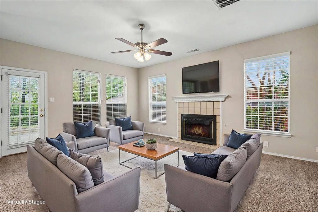 Virtually staged family room that opens to the eat-in kitchen and breakfast nook. Open floorplan