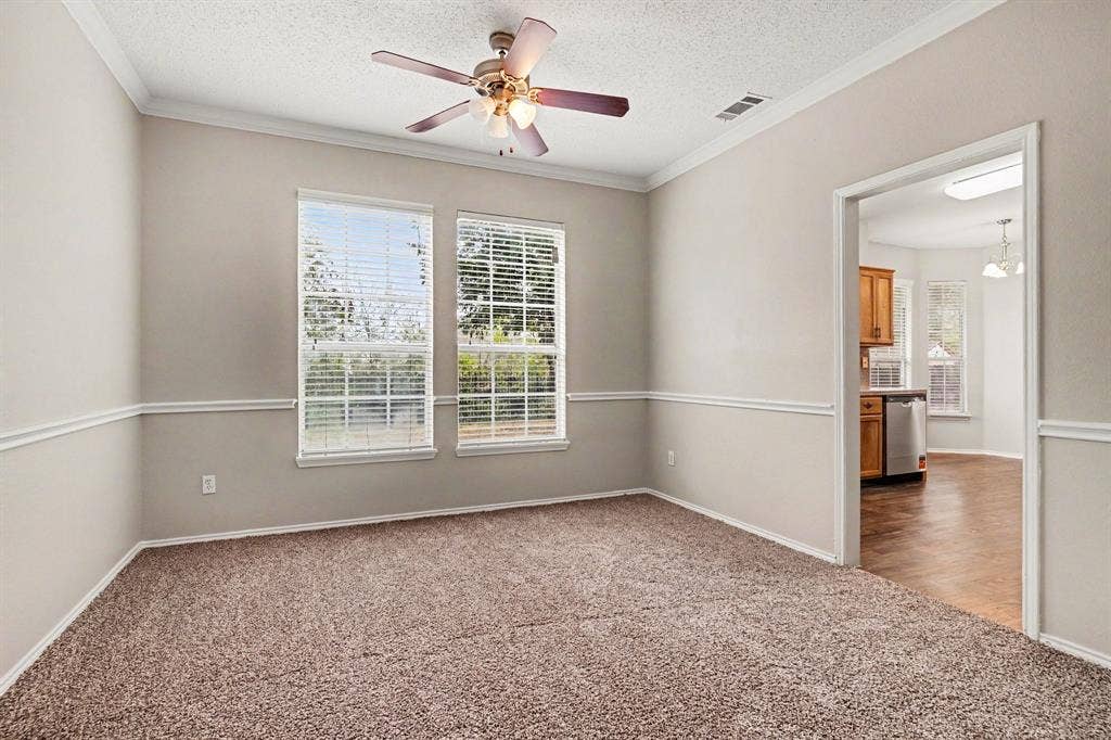 View into the formal dining room. Open to the living room.