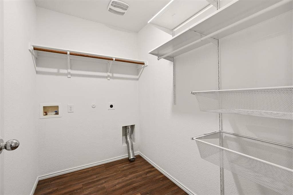 White walls with wood-finish flooring