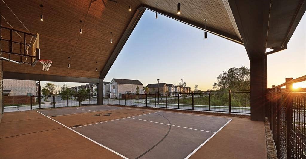 View of sport court featuring community basketball court and healthy amount of natural light