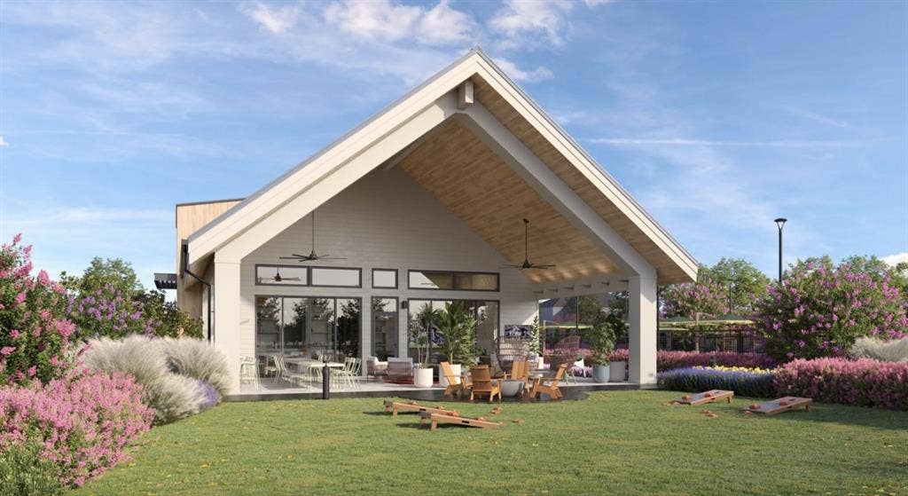 Rear view of house featuring a ceiling fan, a patio area, a lawn, and outdoor lounge area
