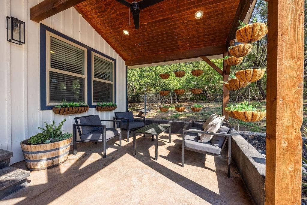 384 Fort Graham Road, Waco, TX 76705 Covered outdoor patio with a stained wood ceiling and recessed lighting