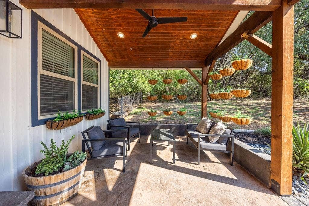 384 Fort Graham Road, Waco, TX 76705 Covered patio featuring a wood-finish ceiling with recessed lighting and a ceiling fan, exposed wood beams, and a concrete slab floor