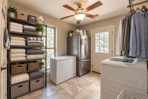 384 Fort Graham Road, Waco, TX 76705 Tiled flooring, overhead ceiling fan, natural light from a window, and a glass-paned door