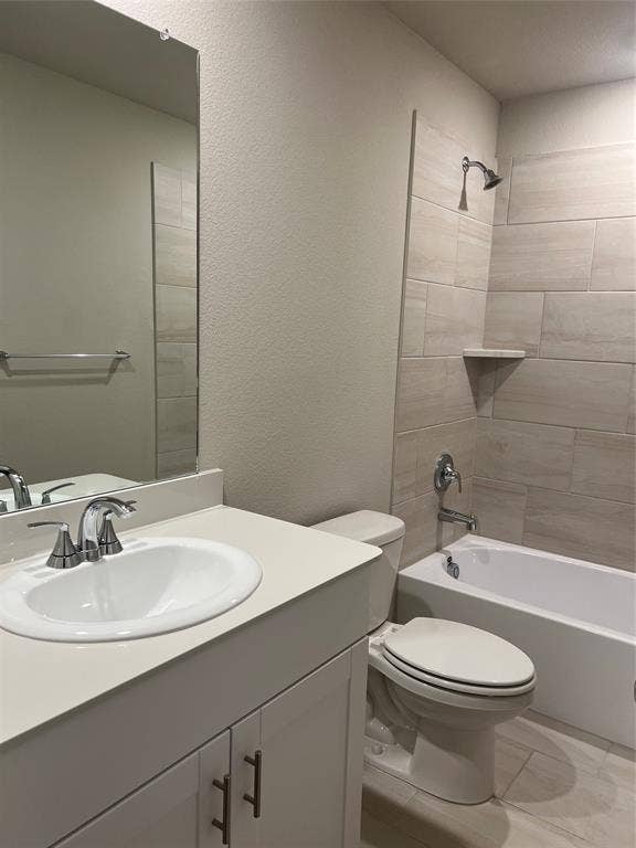 White vanity with an integrated sink, polished chrome faucet, and coordinating hardware