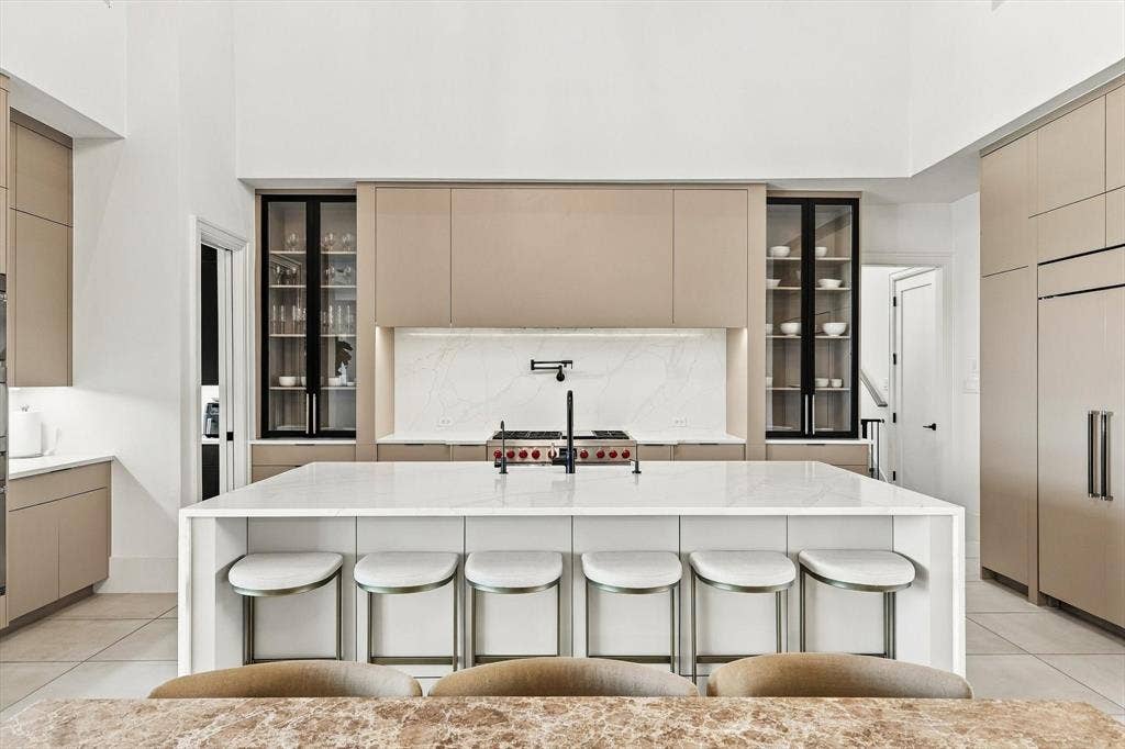 4301 Corabelle Lane, Prosper, TX 75078 Kitchen featuring a large center island with seating, integrated appliances, and a built-in range