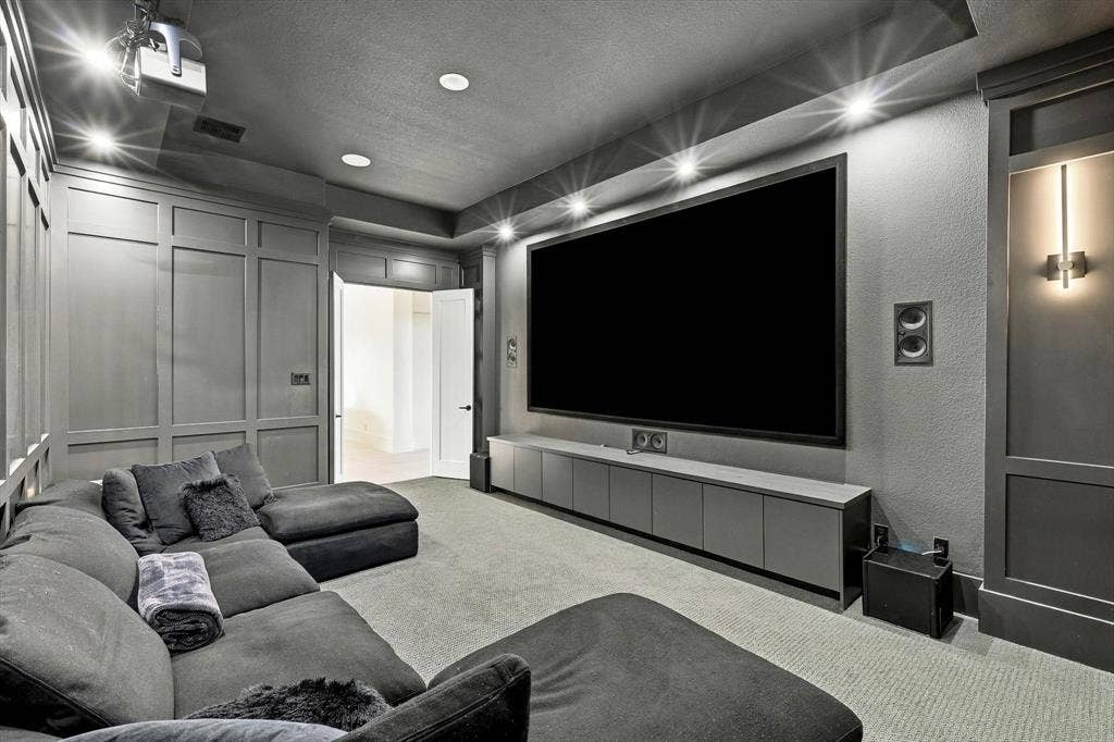 4301 Corabelle Lane, Prosper, TX 75078 Recessed lighting, large projection screen, built-in media console, wall-mounted speakers, and integrated wall paneling
