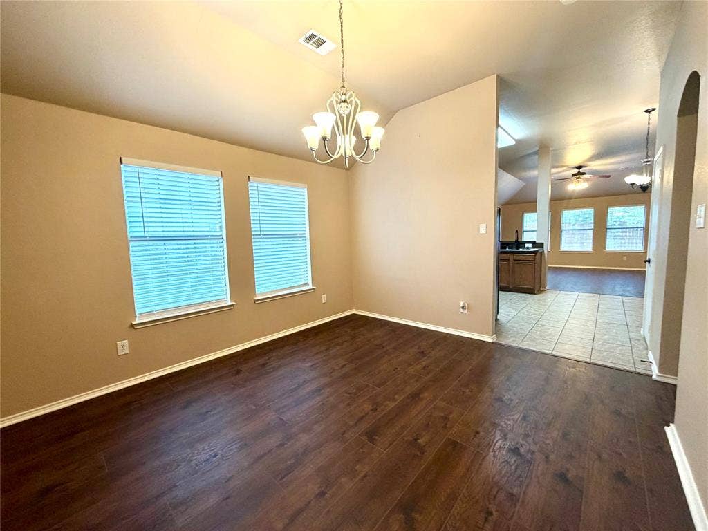 9016 Warren Drive, McKinney, TX 75071 formal dining with kitchen just beyond