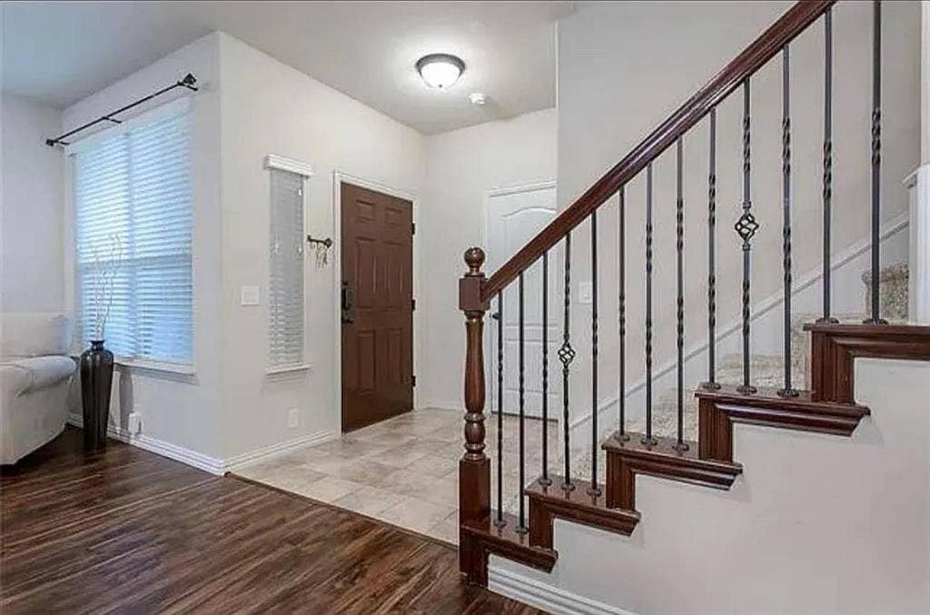Foyer entrance featuring hardwood / wood-style flooring
