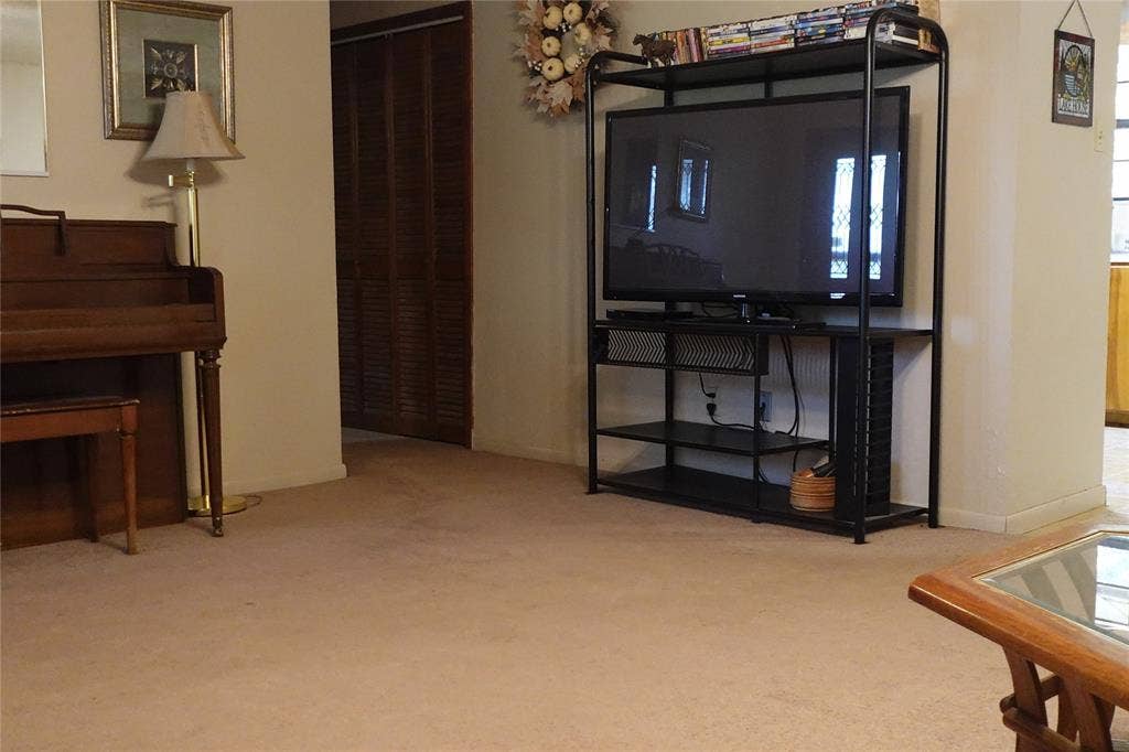 Wall-to-wall carpeting throughout