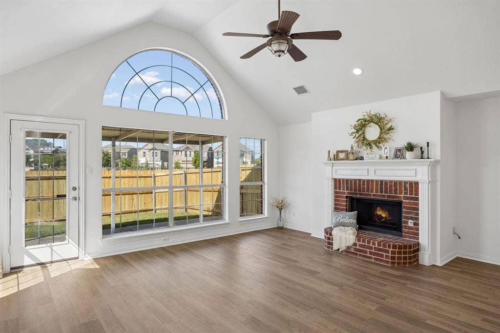 Imagine watching a movie by the warmth of this charming brick fireplace!