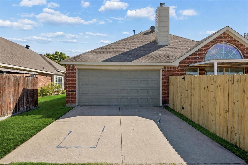 Enjoy the convenience of a two-car rear entry garage, long driveway, and beautifully enclosed backyard setting!
