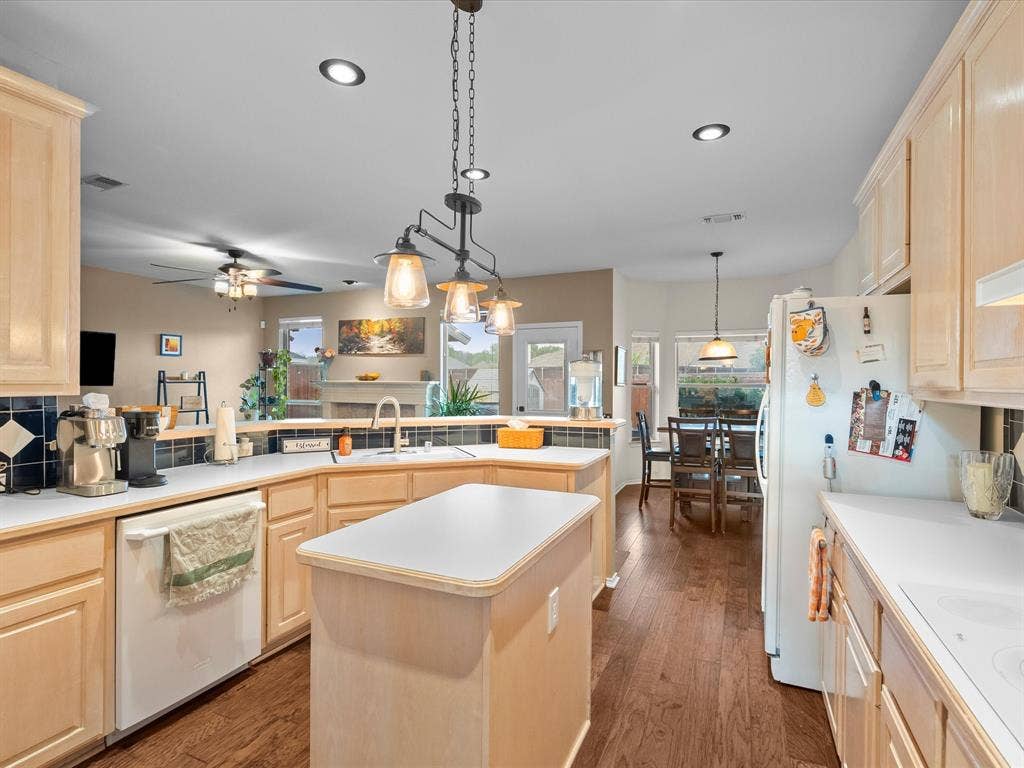 3303 Felicia Court, McKinney, TX 75070 Kitchen featuring light-finish cabinetry, a central island, wood-finish flooring, recessed lighting, and a multi-pendant fixture
