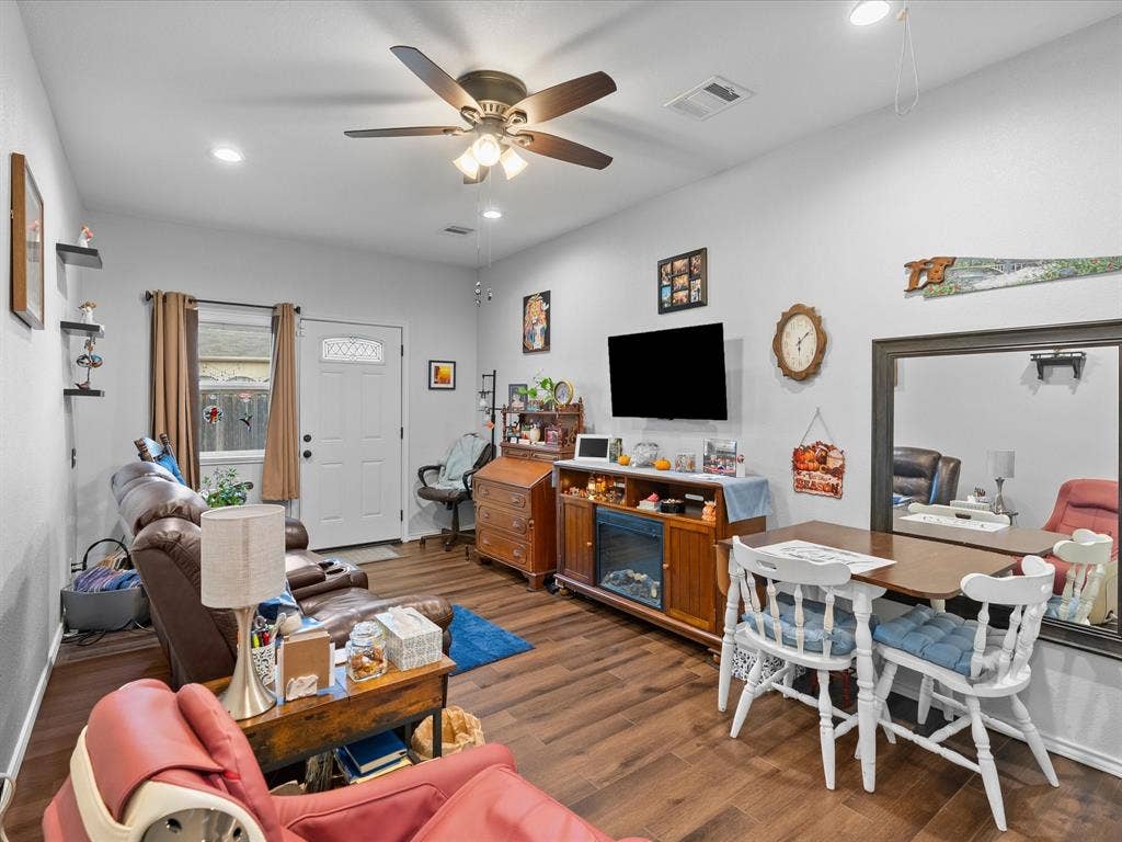 3303 Felicia Court, McKinney, TX 75070 Open-concept area featuring wood-finish flooring, recessed lighting, and a multi-blade ceiling fan