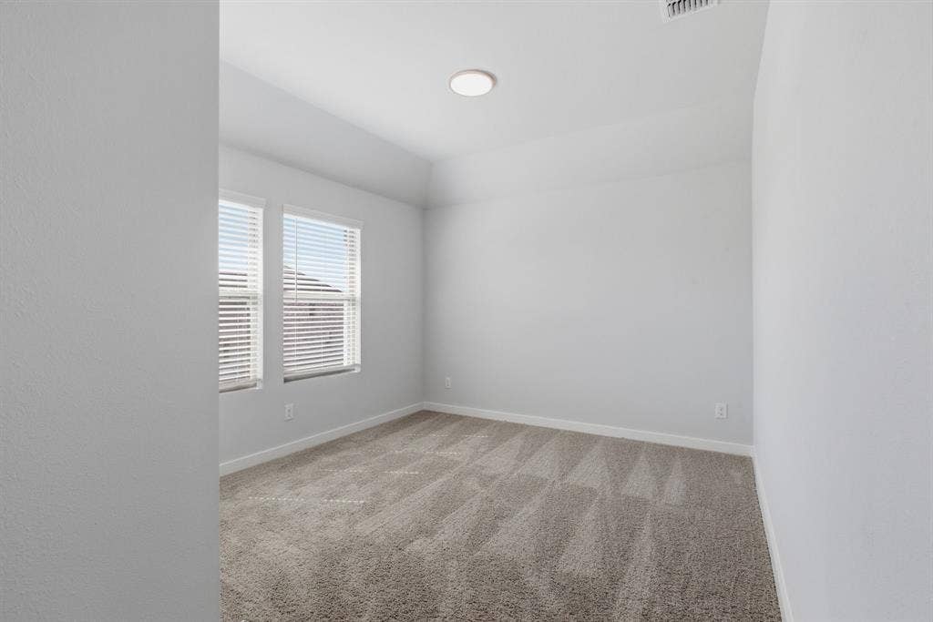 637 Sierra Ridge, Lavon, TX 75166 Recessed ceiling light, neutral tone walls, carpeted flooring, two windows with blinds