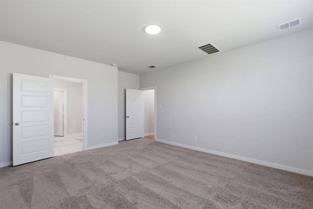637 Sierra Ridge, Lavon, TX 75166 Plush carpeting and white paneled doors